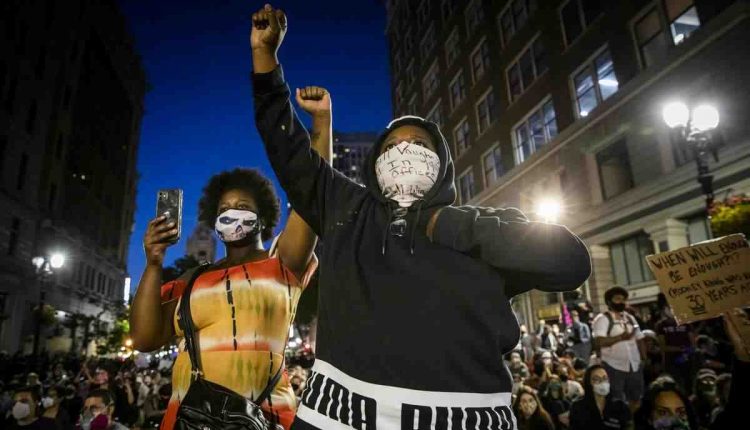 Residents gather for gun safety in Encinitas during the Wear Orange weekend